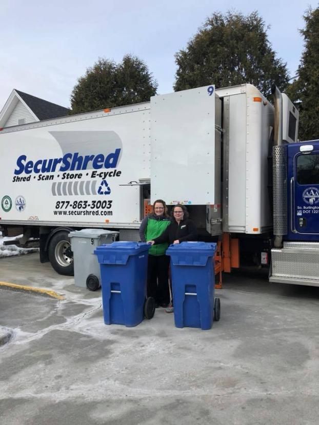 An employee at SecurShred